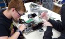 High school students work on reverse engineering