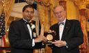 Subhash A. Khot with Arden L. Bement, Jr., NSF Director holding a plaque award