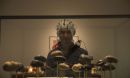 person with EEG cap looking at art
