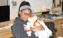Girl holds robot