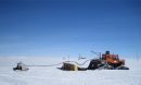 Researchers collect data in Greenland.