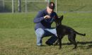 a vet and trauma REU student and his dog
