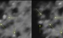 the arrows point to titanium dioxide nanocrystals