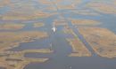 salt marshes about 30 miles (50 km) southeast of New Orleans