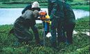 Scientists drill into frozen Siberian peat bogs to determine the bogs' impact on climate.
