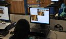 Photo of fourth-graders using Evolution Readiness software.