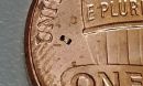 the microrobot can be seen just to the right of the âUâ in United States