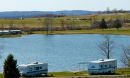 campers around a pond