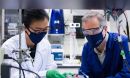 researchers examine their newly-designed sea water electrolyzer