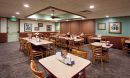 a dining room of a Denny's restaurant illuminated with Cree LR6 LED downlights.