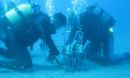 scientists remove one of the incubation devices