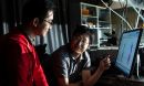 graduate student Xinwei Li, left, and postdoctoral researcher Weilu Gao