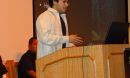 Photo of Raphael Perea delivering a presentation.