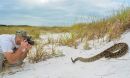 Mark Margres photographs an Eastern Diamondback Rattlesnake
