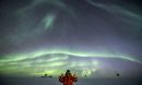 Robert Schwarz gives a thumbs up at the South Pole