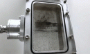 animation showing hydrocarbons clump together and rise through water during purification
