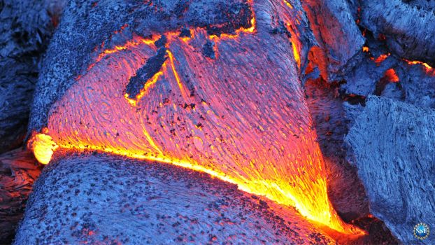 Image of glowing lava flowing.