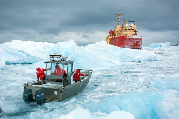 The research vessel Laurence M. Gould attempts to sail through ice-choked waters near Palmer Station off the Antarctic Peninsula.