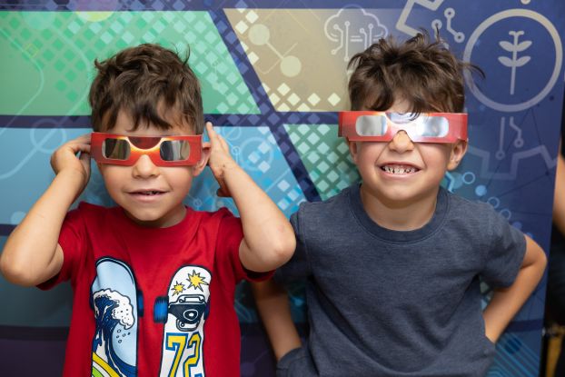 Eclipse information table at the New Mexico Museum of Natural History and Science