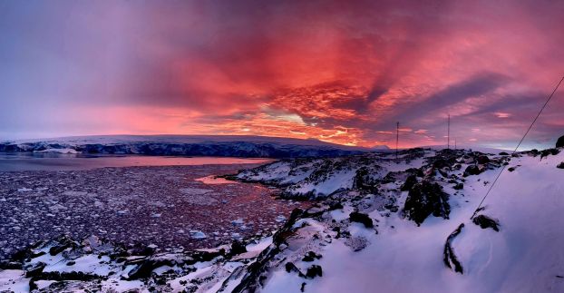 Sunrise overlooking Arthur’s Harbor on the south-west coast of Anvers Island in the Palmer Archipelago of Antarctica.