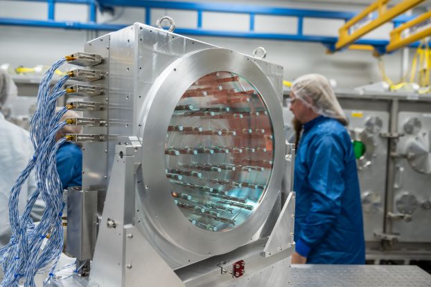 A shiny metal apparatus inside a laboratory