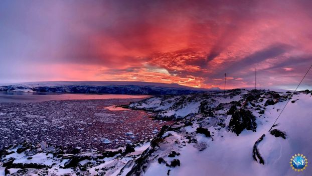 sunrise overlooking Arthur’s Harbor on the south-west coast of Anvers Island in the Palmer Archipelago of Antarctica