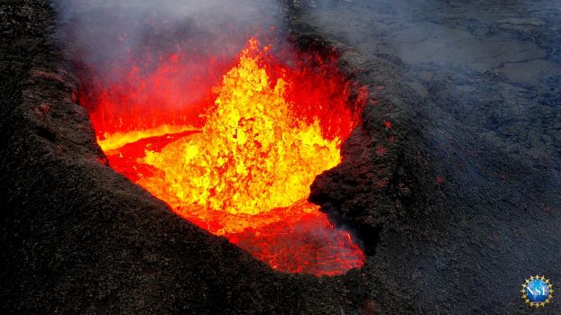 Bursts of lava light the night during the Sundhnúkur eruption in Iceland.