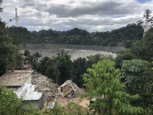 Damage to the cable car shed for the 305-meter telescope at Arecibo Observatory, after the telescope’s collapse on Dec. 1, 2020. The top of Tower 12 is visible in the foreground.