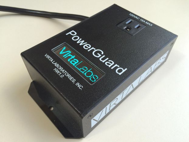A black electronic box containing an electrical outlet and labeled "PowerGuard" and "VirtaLabs"