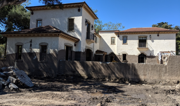 A house in front of a mudflow 