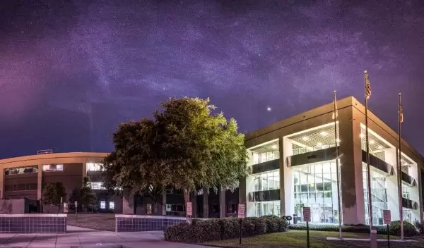 National High Magnetic Field Laboratory with a starry sky