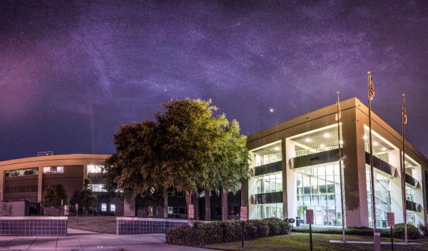 National High Magnetic Field Laboratory with a starry sky