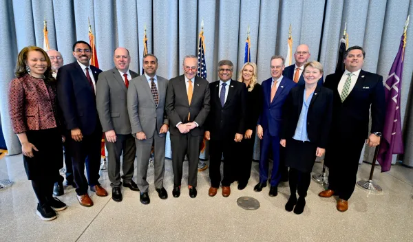 NSF director Sethuraman Panchanathan, Senator Charles E. Schumer, and representatives from Micron Technology, Inc.
