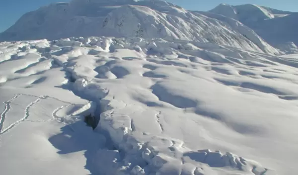 Denali Fault trace cutting through Gakona Glacier, just after a 2002 earthquake.