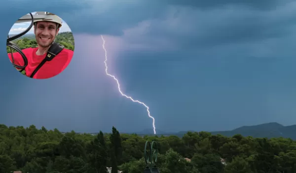 Scientist Evan Gora inspects a lightning strike at a forested site on Barro Colorado Island, Panama.