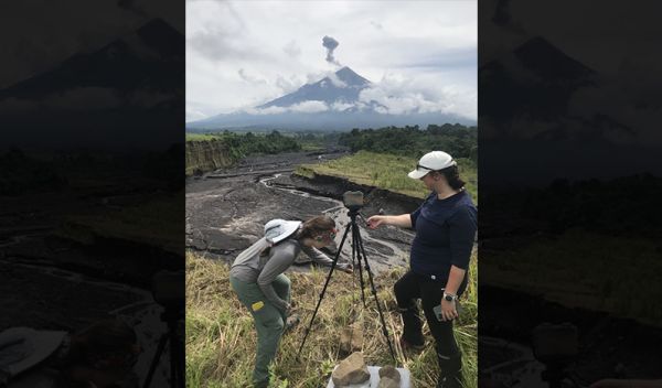 Researchers set up mudflow monitoring equipment in the shadow of Fuego volcano in Guatemala.