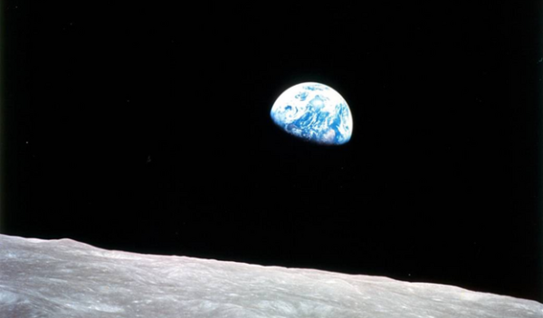 Earth's continents — unique in the solar system — are visible, rising above the ocean. Apollo 8 pilot Bill Anders took this iconic photo of Earth from lunar orbit on December 24, 1968.