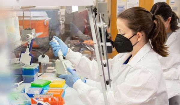 Researcher Emily Garner prepares water samples for analysis.