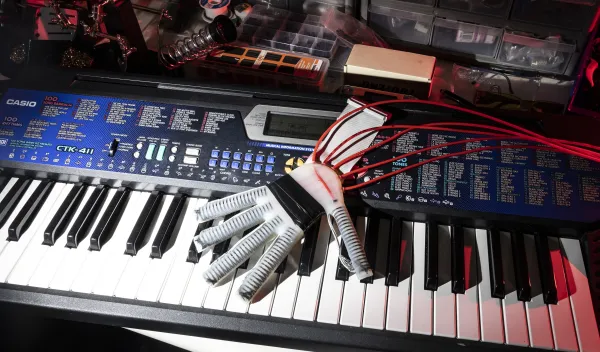 The soft robotic glove developed by researchers in FAU's College of Engineering and Computer Science integrates five actuators into a single wearable device that conforms to the user's hand.