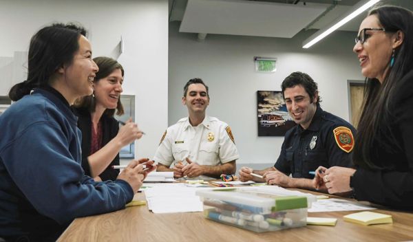 San Francisco Fire Department Community Paramedicine members and San José State University researchers engage in a participatory brainstorming activity on interventions to prevent and treat moral injury and strengthen equity capacity in community paramedicine.