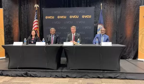 NSF Director Sethuraman Panchanathan and Congressman Rob Wittman at a STEM panel at Virginia Commonwealth University on December 8, 2023.