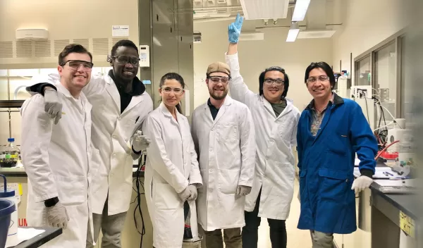CSOE student researchers being trained in electroanalytical technques by post-doctoral mentor Dr. Christian Malapit (right) in the labs of Prof. Shelley Minteer and Prof. Henry White of the University of Utah