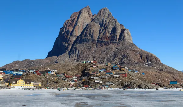 Uummannaq Harbor viewed from the sea ice.