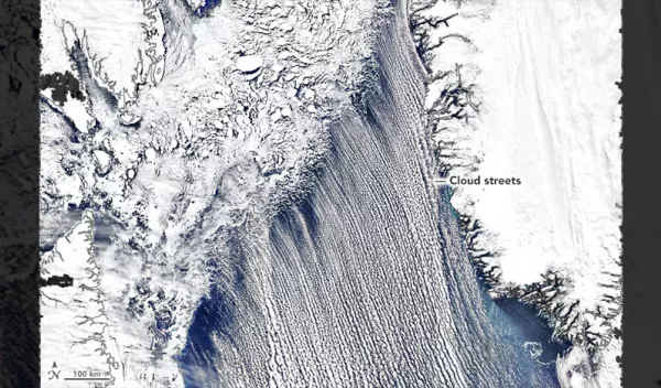 A few times every spring, the skies over the Labrador Sea fill with row after row of long, parallel bands of cumulus clouds. The magnificent organization of these clouds, known as cloud streets, was on full display when this image was acquired on April 19, 2022.