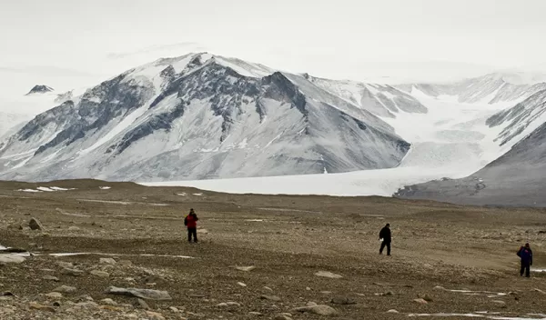 Several U.S. Antarctic Program participants explore Taylor Valley in the McMurdo Dry Valleys, one of the very few regions in Antarctica largely devoid of ice.