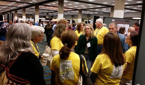 students and teachers at a conference