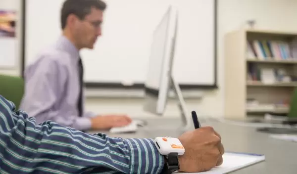 David Kotz working at a computer