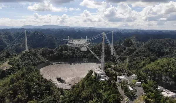 The 900-ton instrument platform at Arecibo Observatory's 305-meter telescope hanging 405 feet above the telescope's dish.