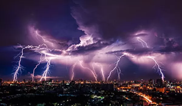 Numerous lightning strikes during a thunderstorm.