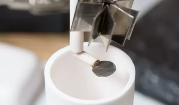 Aair electrode, metal electrode and cup part of a molten air battery configuration